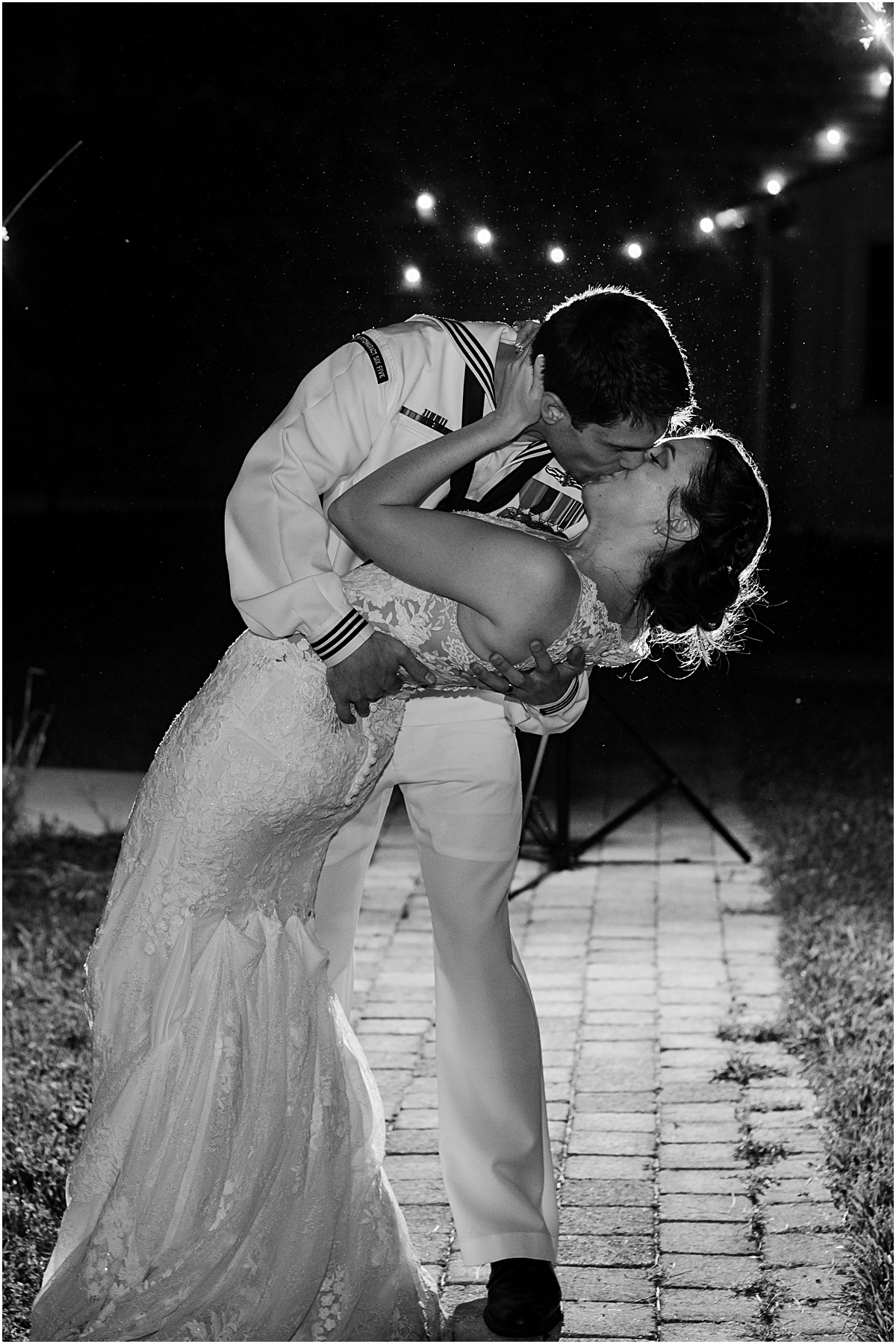 Ryan dipping and kissing Gabby. Wedding photography in Maryland done by Ashley.