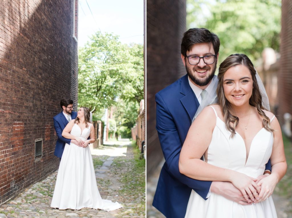 Seamus and Jessica posing in a mossy alleyway beside a historic building, wedding photography done in Alexandria Virginia
