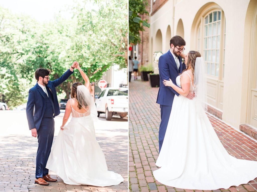 The groom spinning the bride on a city street, wedding photography done in Alexandria Virginia