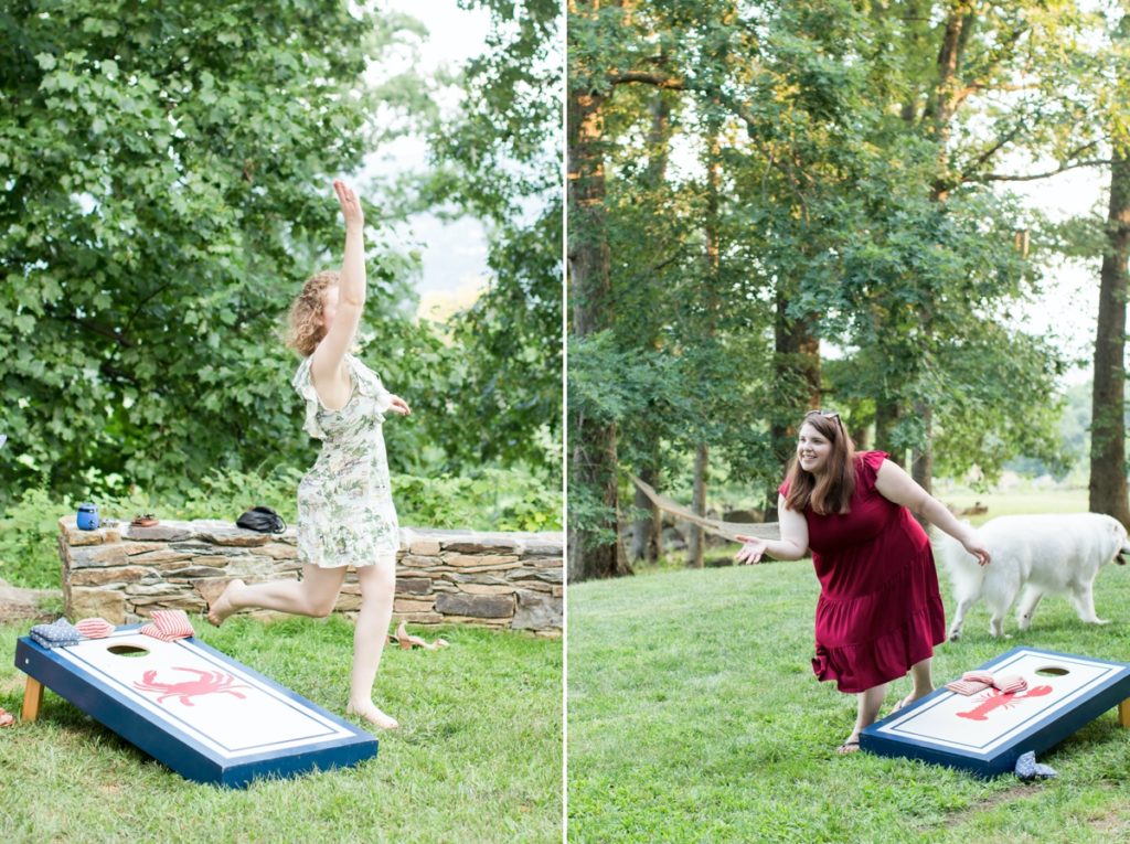 People playing cornhole during the rehearsal dinner photography session.