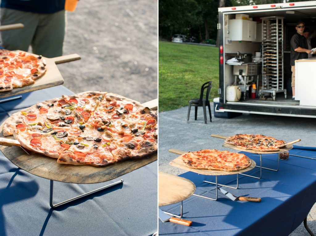 The pizza catered to the rehearsal dinner photography session for the bride and groom. 