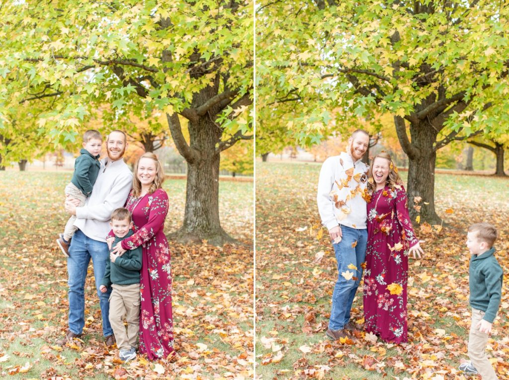 A family playing in the colorful leaves during their Fall portraits.  